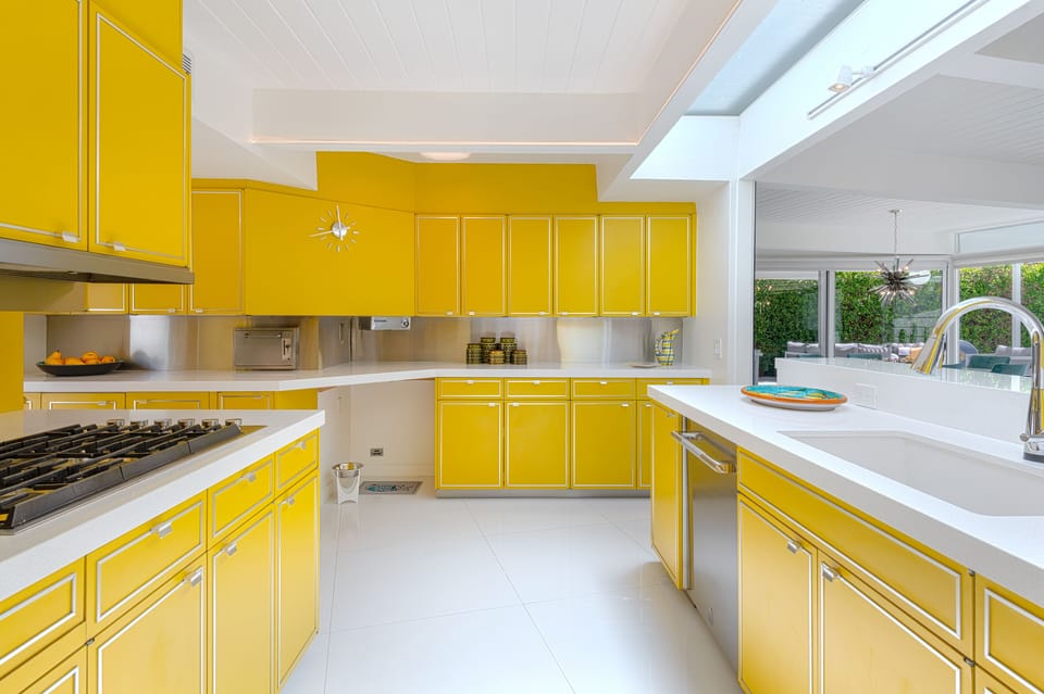 Kitchen facing south with gas stove.  