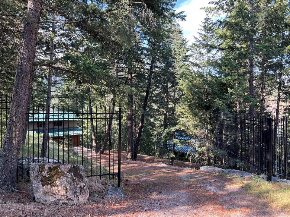 Gate entry to downhill driveway