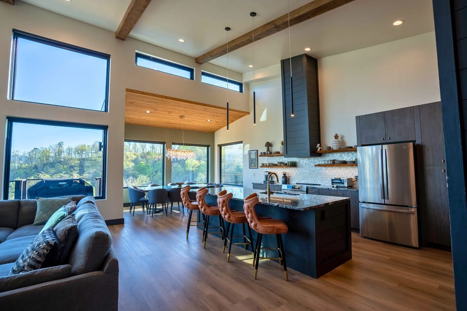 Chef's kitchen and stylish living room designed for gathering, cooking, and connection