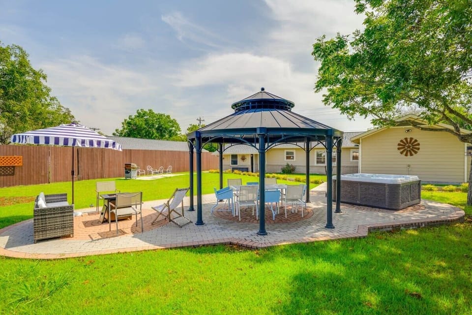 Huge backyard entertainment paradise! There are lights under the gazebo and around the pathways & a few flood lights in the back yard. WIFI reaches to the gazebo outdoor workspace, desk, outdoor office space. *some furniture has been upgraded