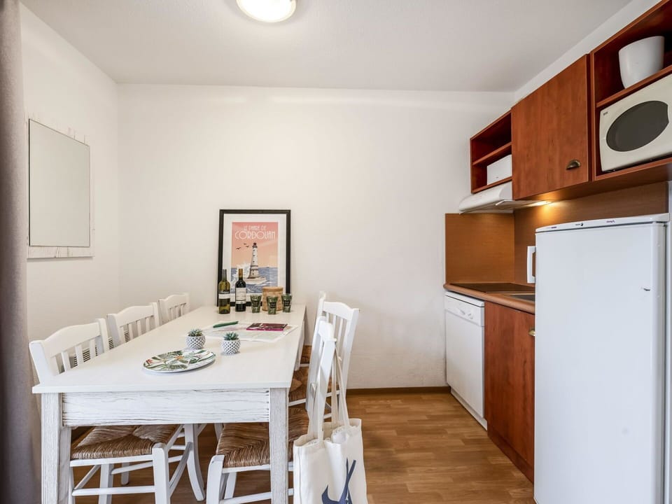 Property, Furniture, Table, Cabinetry, Wood, Interior Design, Flooring, Floor, Picture Frame