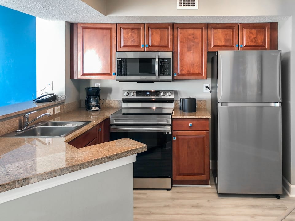 The kitchen has brand new stainless steel appliances!