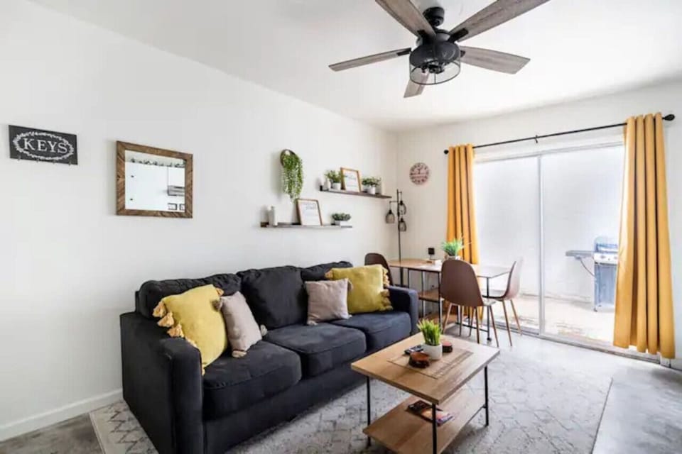 - Relax and unwind in our cozy living area of the home in Tucson, Arizona - Sink into plush sofas and enjoy a cozy atmosphere perfect for lounging - Our open living area creates a seamless flow between relaxation and dining spaces