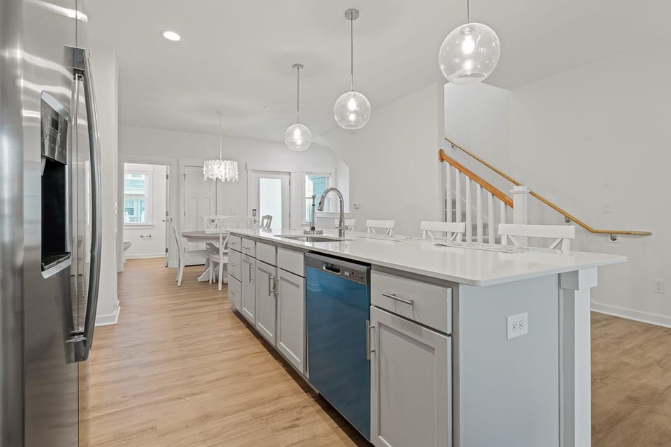 Kitchen Area with Bar Seating on Second Level