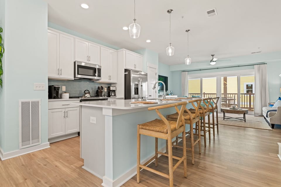 Kitchen Area with Bar Seating on Second Level
