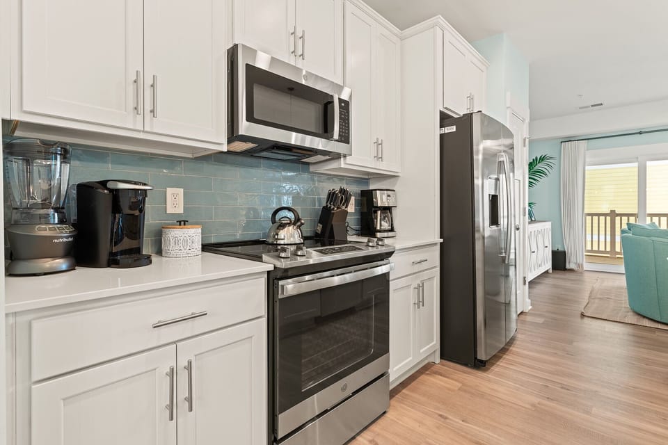 Kitchen Area with Bar Seating on Second Level