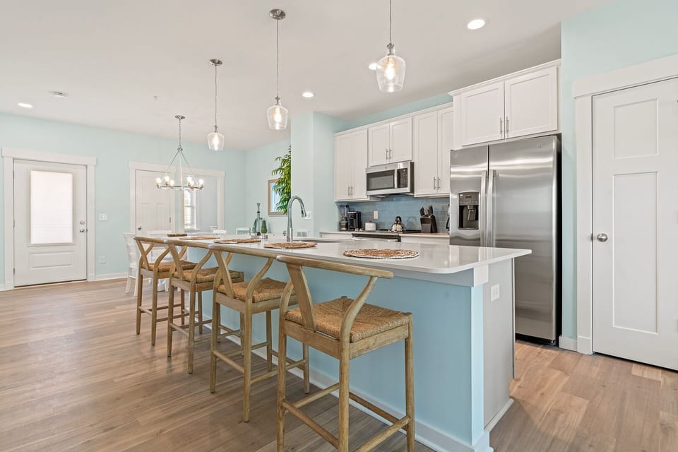 Kitchen Area with Bar Seating on Second Level