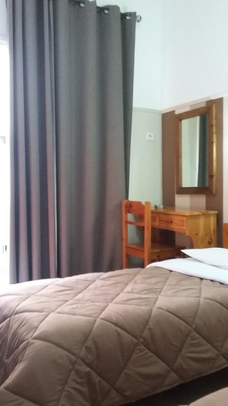 Desk, blackout drapes, WiFi (free), bed sheets