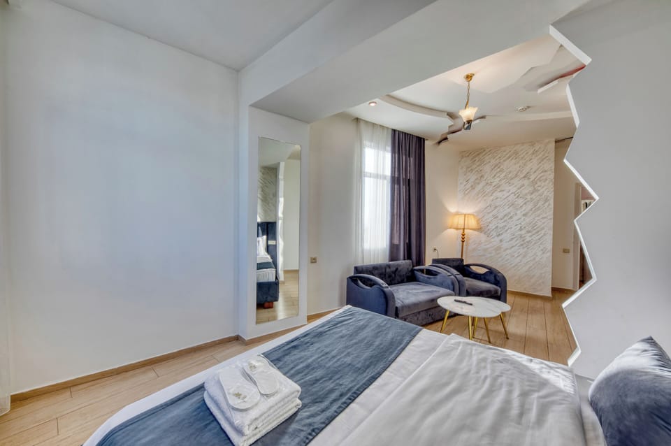 Standard Double Room | Premium bedding, down comforters, blackout drapes, iron/ironing board