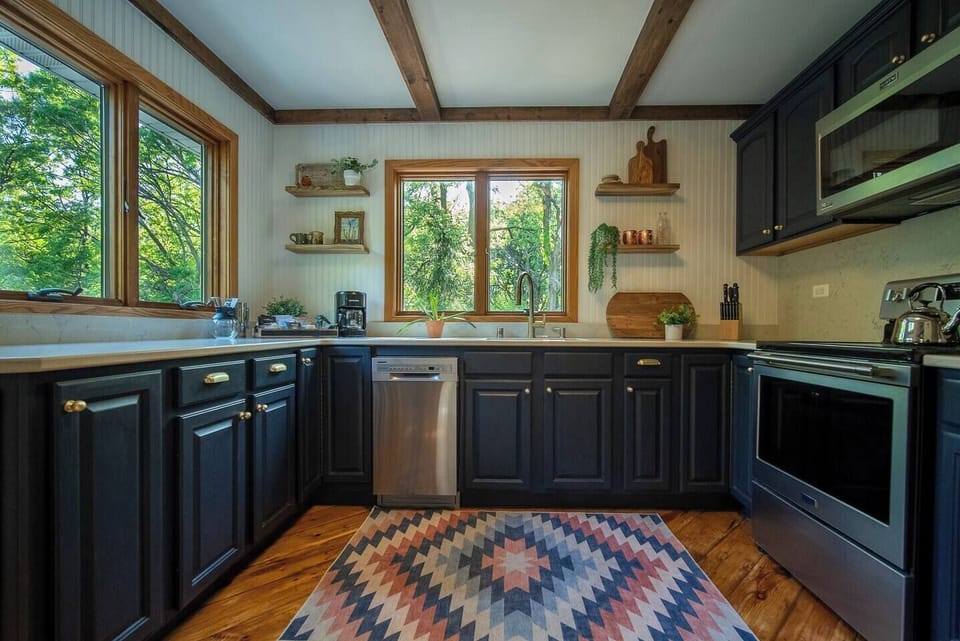 Quartz countertops and all new appliances and cookware make using the kitchen a pleasure.