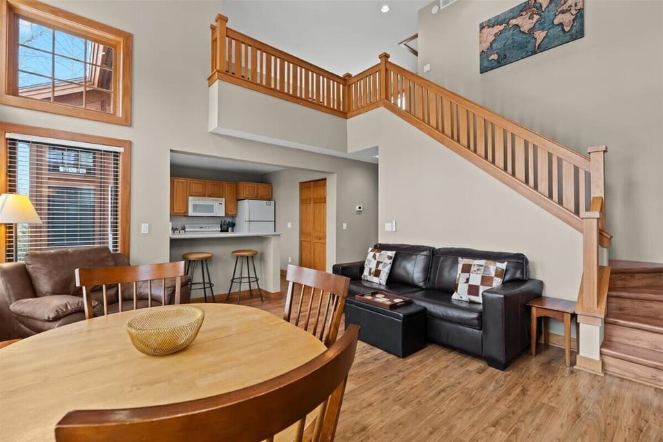Living space stairs going up to loft