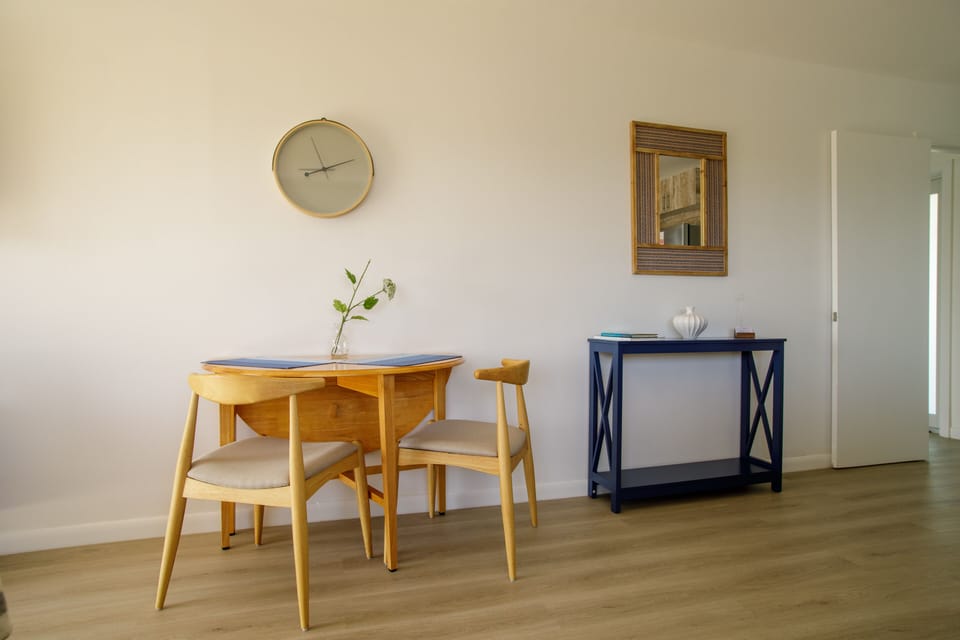 Another space to eat with the family. Table folds out to fit additional chairs.