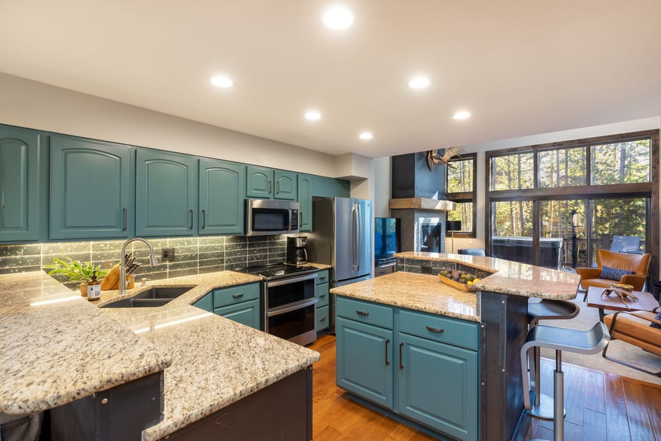 Kitchen with new appliances and granite counter tops