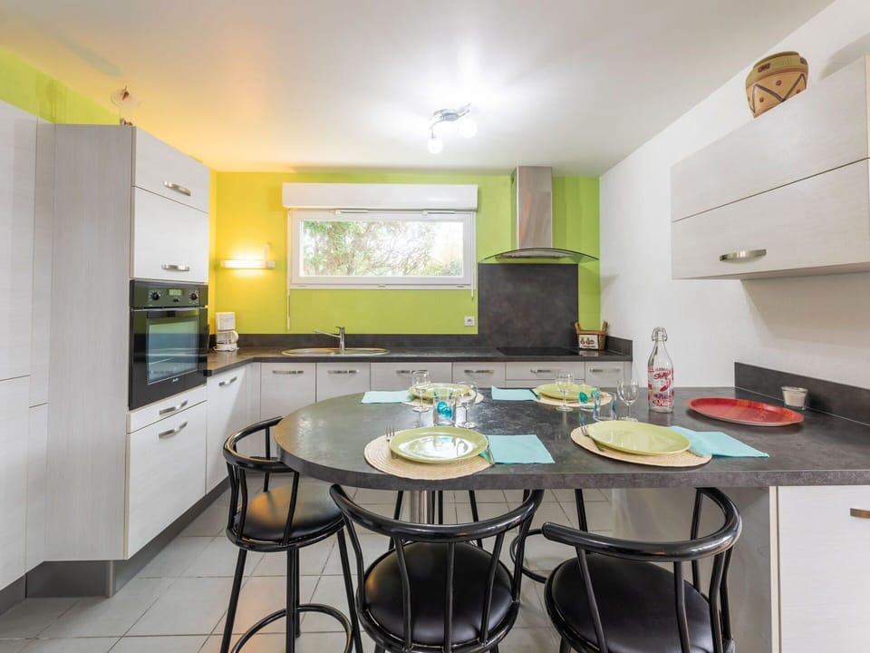 Table, Property, Furniture, Cabinetry, Countertop, Kitchen, Wood, Interior Design, Lighting, Flooring