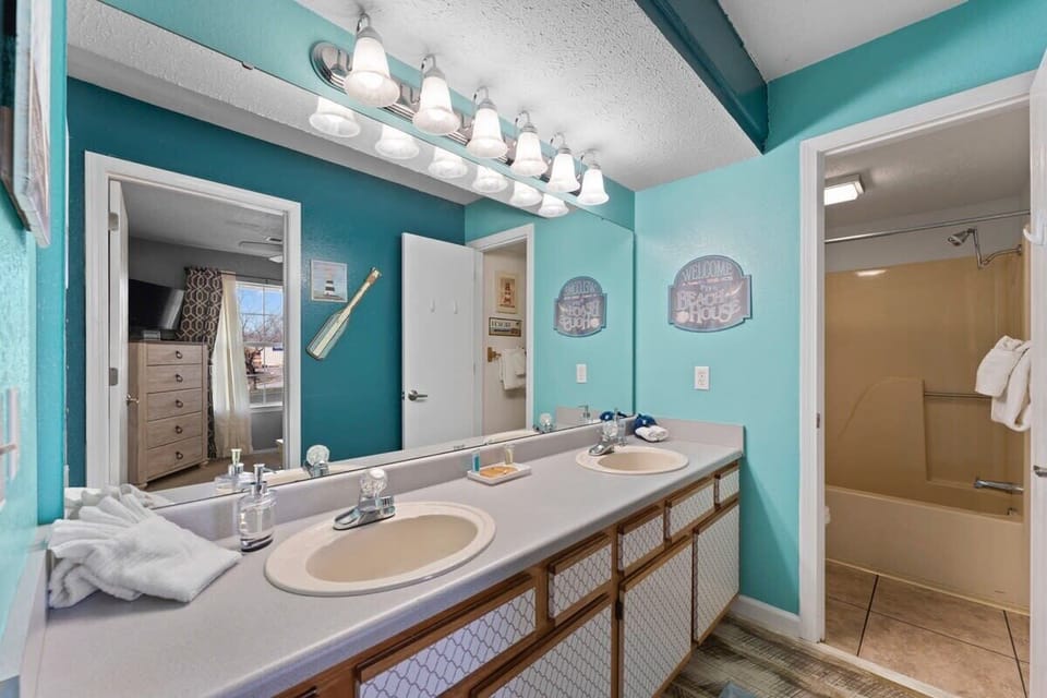Double vanity along with tub and shower
