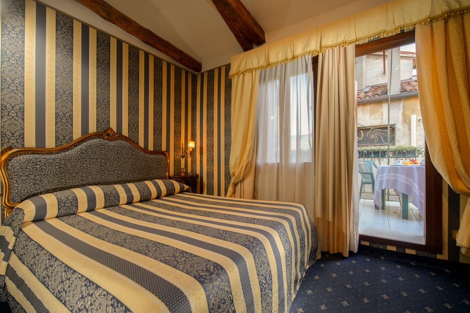 Superior Double Room, Terrace | Down comforters, minibar, in-room safe, free WiFi