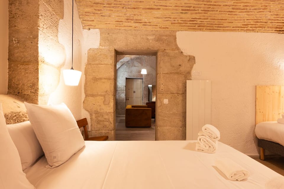 Atypique | Premium bedding, pillowtop beds, in-room safe, desk