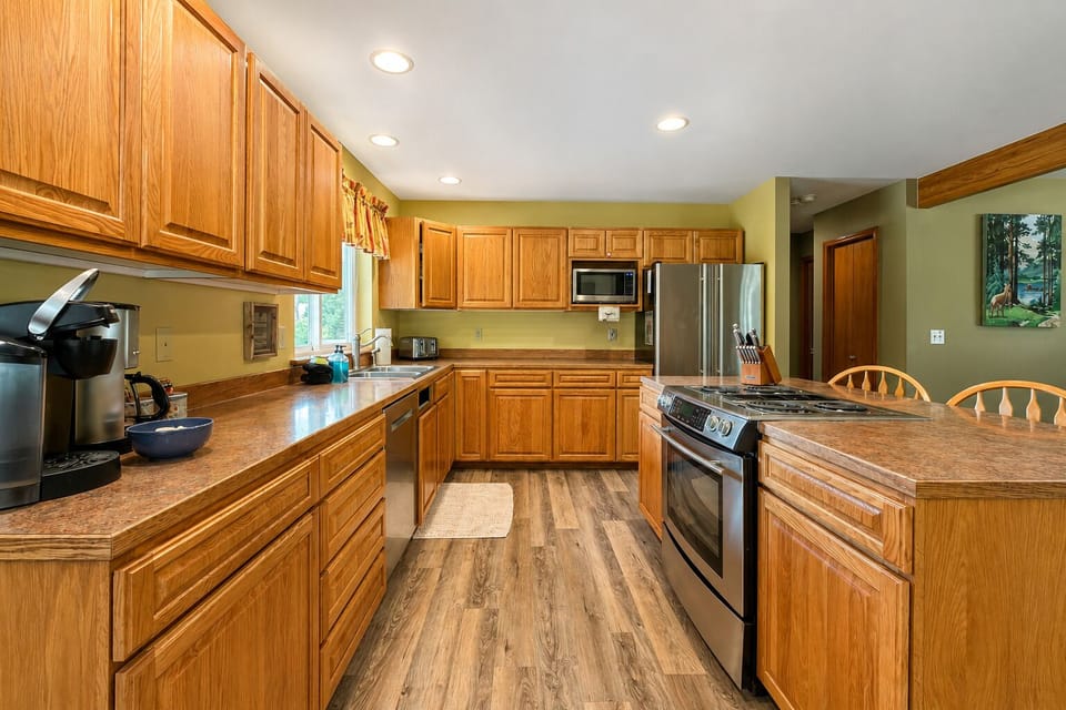 Full Kitchen includes dishwasher and all of the necessary cooking basics for your stay.
