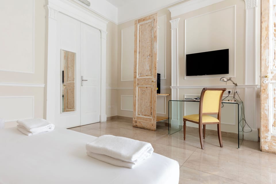 Family Room | Premium bedding, in-room safe, desk, soundproofing
