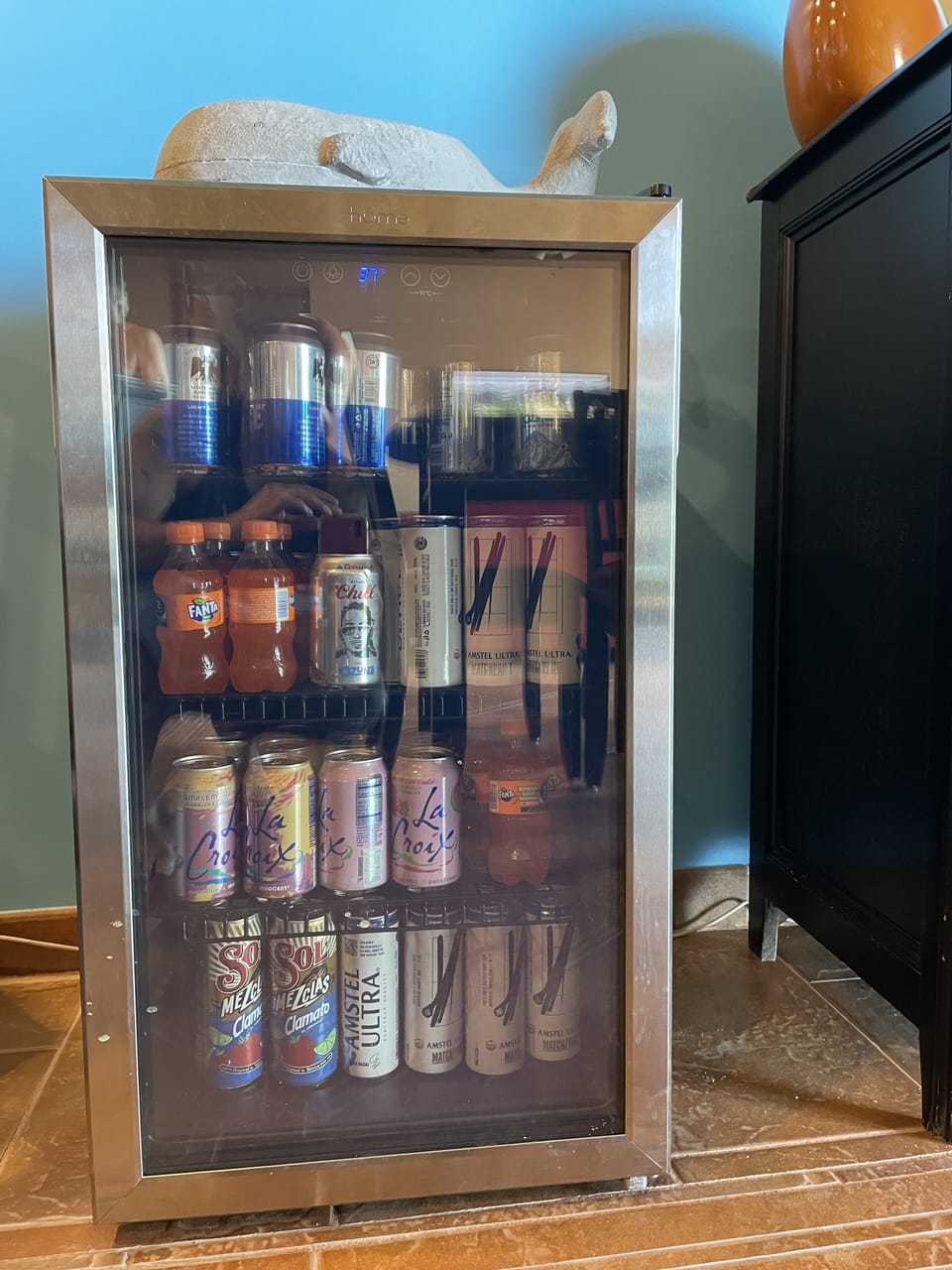 Sorry, Beverages not included. Per LP, prohibited. Great for space in fridge.