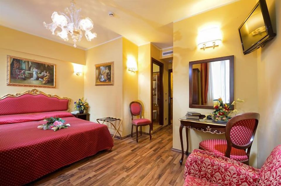 Triple Room | Living area | Flat-screen TV