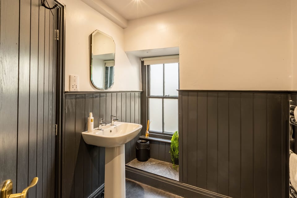 Signature Room | Bathroom | Hair dryer, towels