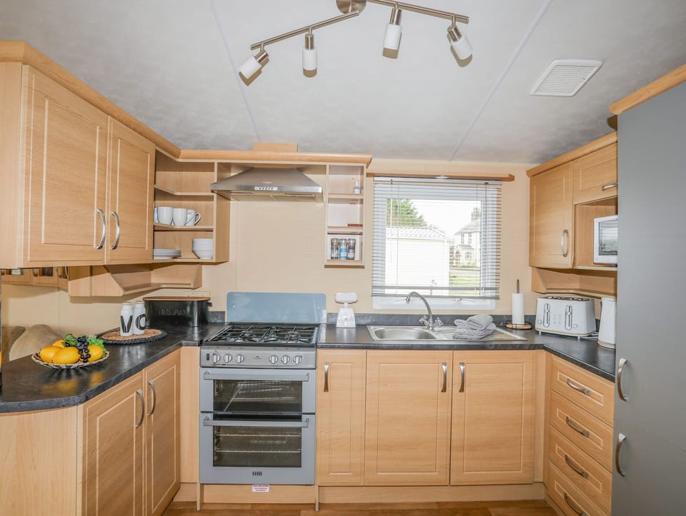 Fridge, electric kettle, toaster, cookware/dishes/utensils