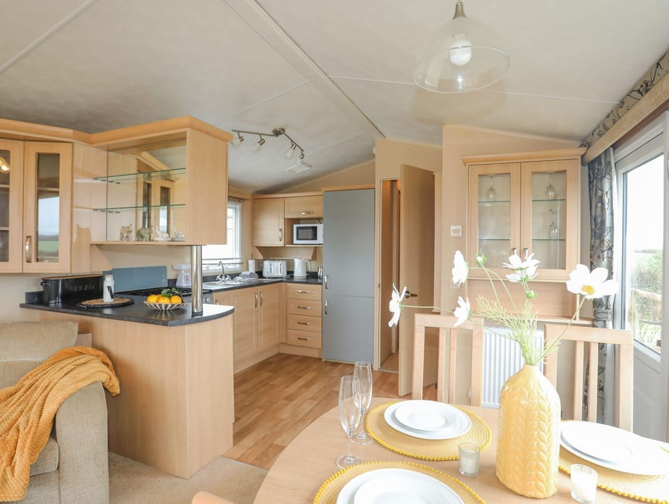 Fridge, electric kettle, toaster, cookware/dishes/utensils