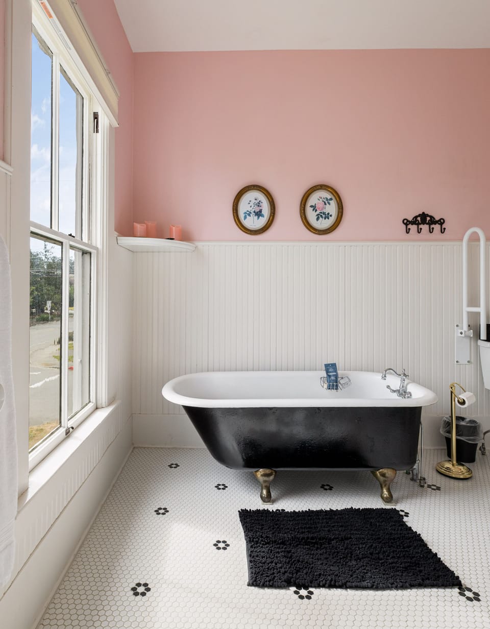 Bathroom off bedroom. Original 1887 clawfoot tub.