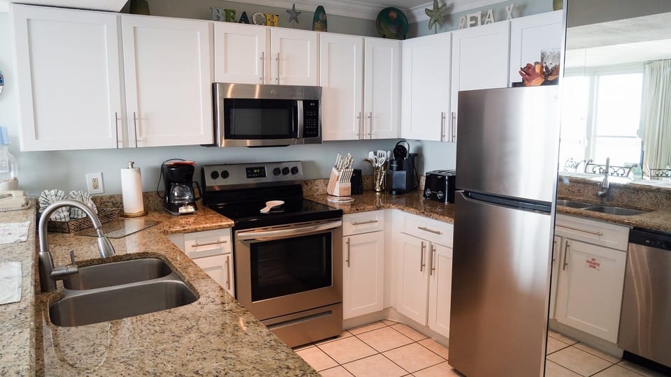 Condo, 1 Bedroom | Private kitchen | Coffee/tea maker, fridge, oven, toaster