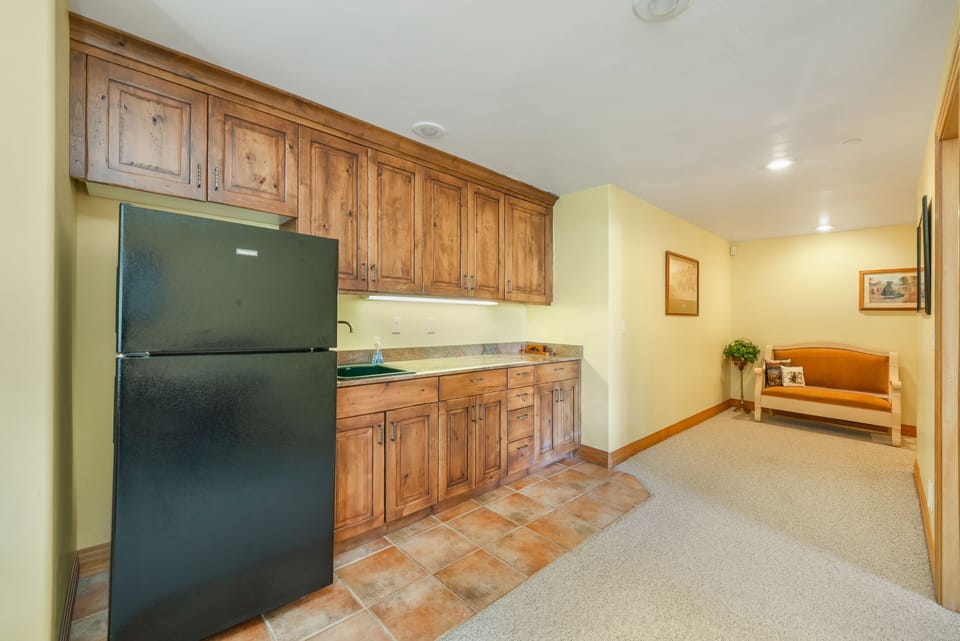 Bottom floor family room refrigerator 