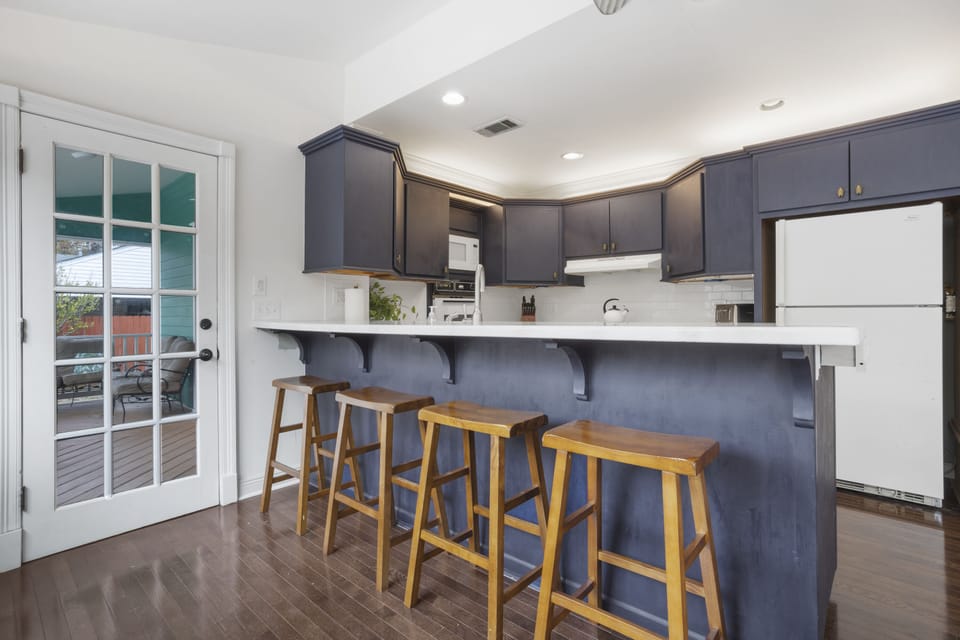Fully stocked kitchen with eat-in island