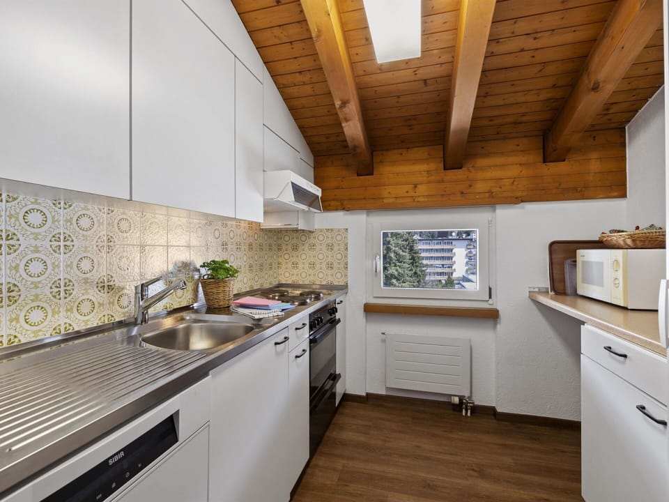 Cabinetry, Countertop, Property, Kitchen Sink, Furniture, Sink, Building, Tap, Wood, Kitchen Stove