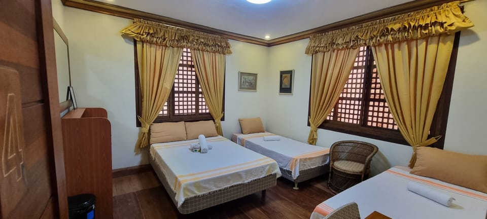 Basic Quadruple Room | Soundproofing, iron/ironing board (on request), WiFi