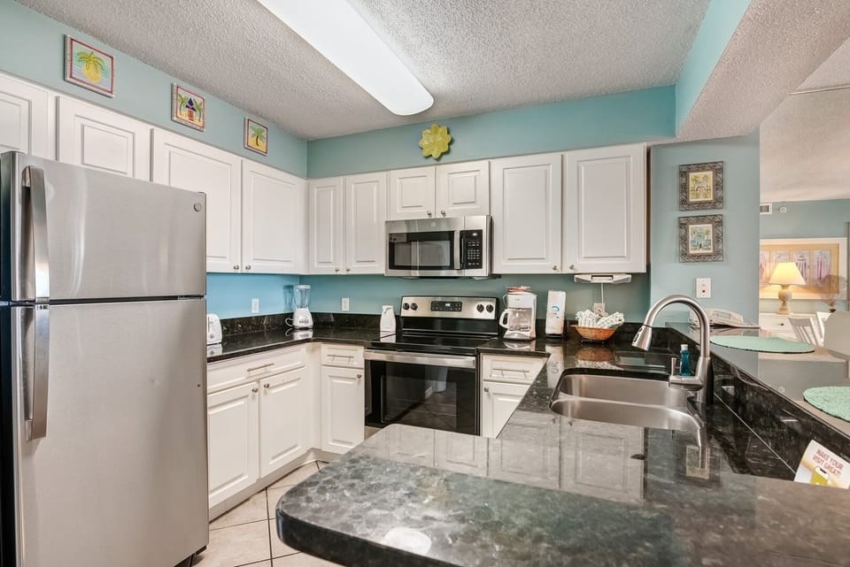 Condo, 2 Bedrooms | Private kitchen | Coffee/tea maker, fridge, oven, toaster