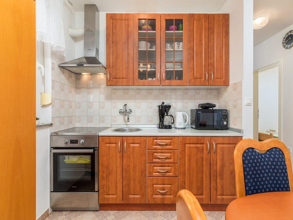 Apartment (Two Bedroom Apartment with Terrace) | Private kitchen | Fridge, dining tables