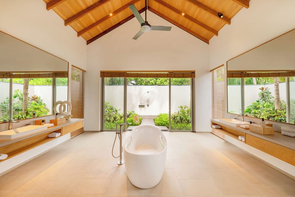 RAAYA Residence | Bathroom | Shower, rainfall showerhead, free toiletries, hair dryer