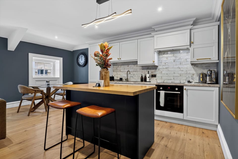 Luxury Apartment | Private kitchen | Espresso maker, coffee/tea maker, electric kettle, dining tables