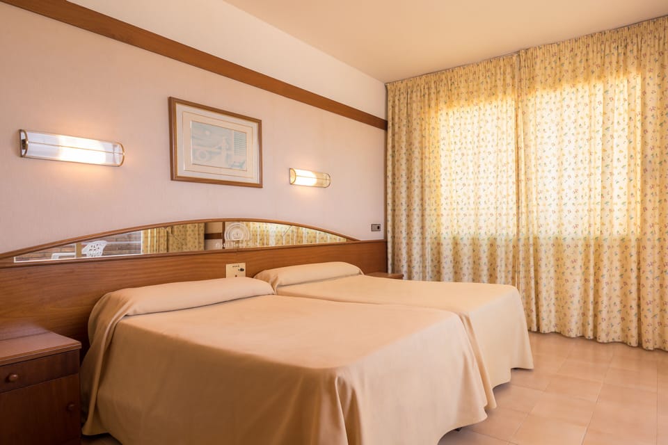 Minibar, desk, blackout drapes, free WiFi