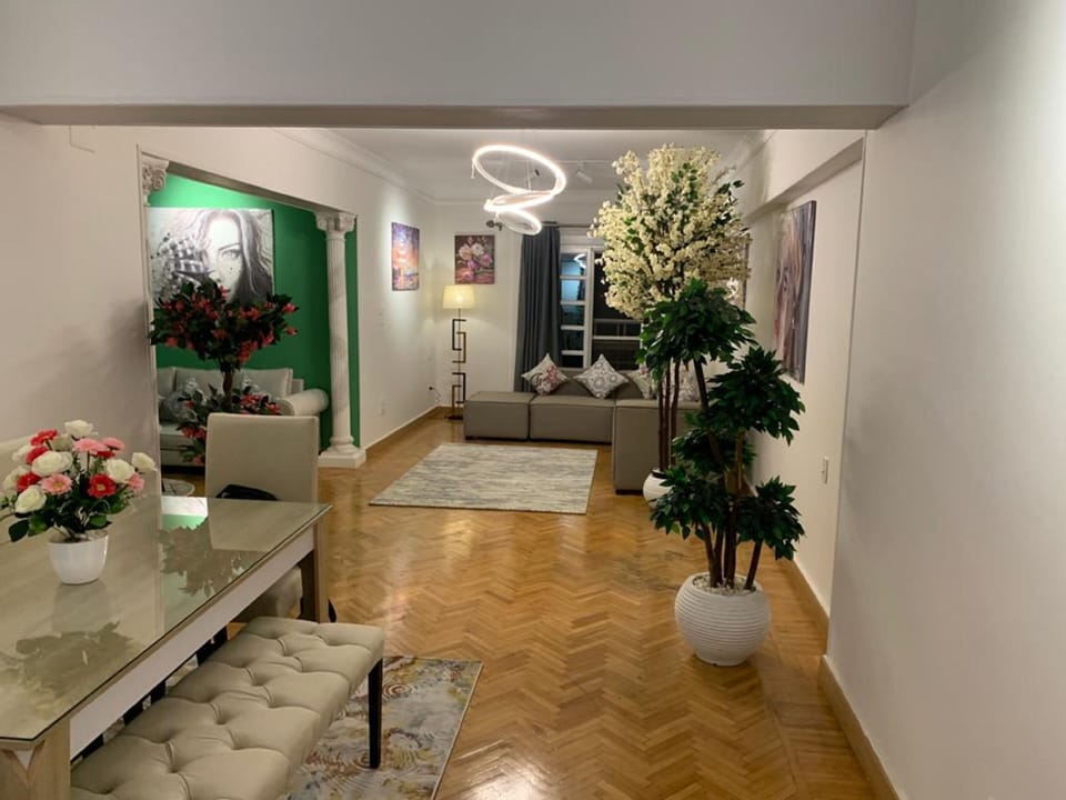 Grand Apartment | Living area | Flat-screen TV