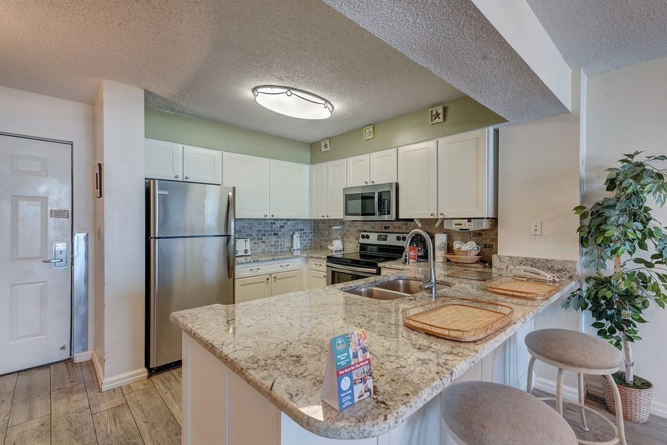 Condo, 2 Bedrooms | Private kitchen | Coffee/tea maker, fridge, oven, toaster