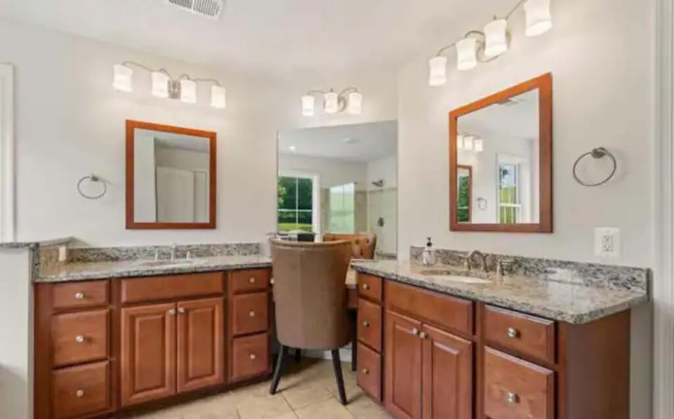 Master Bathroom with soaking tub and adjacent shower.