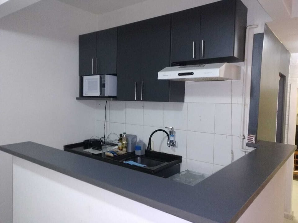 Apartment | Private kitchen | Fridge, microwave, stovetop, cookware/dishes/utensils