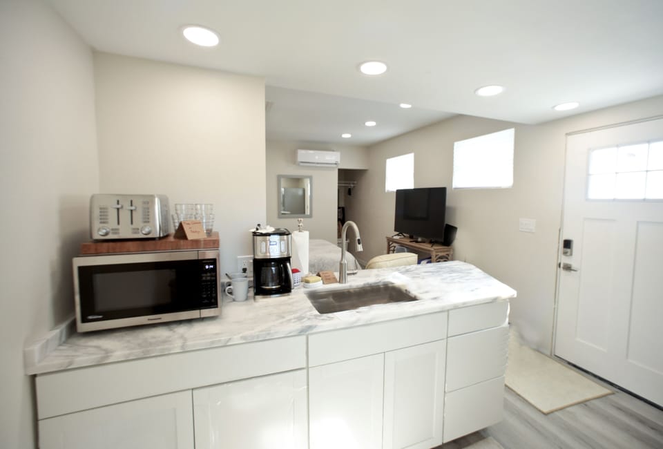 Kitchen will have a countertop for eating, all utensils and shelving for storage