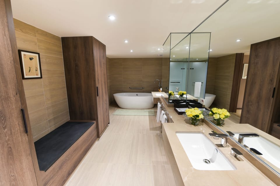 Shower, eco-friendly toiletries, hair dryer, slippers
