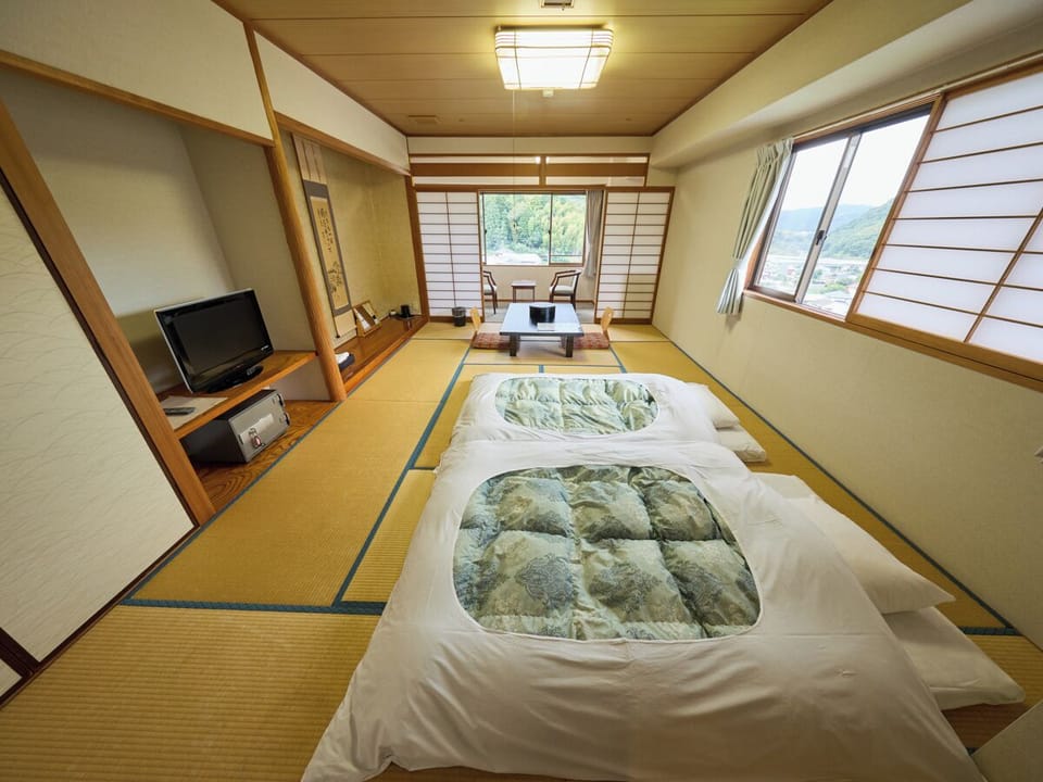 Japanese-style Quadruple Room, Non Smoking | Down comforters