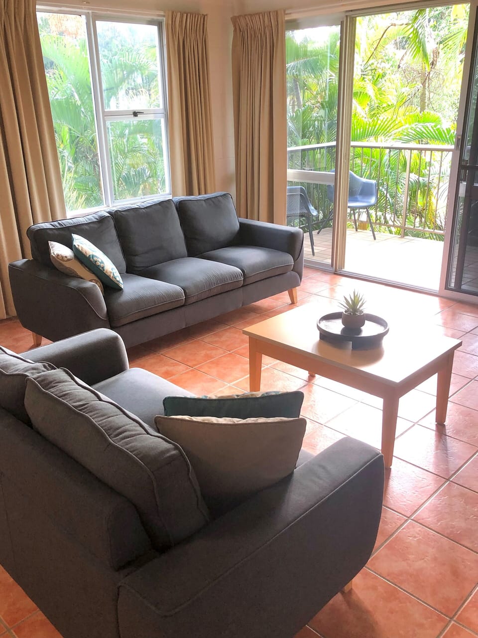 Lounge with comfy sofas and your own balcony to soak in the fabulous view