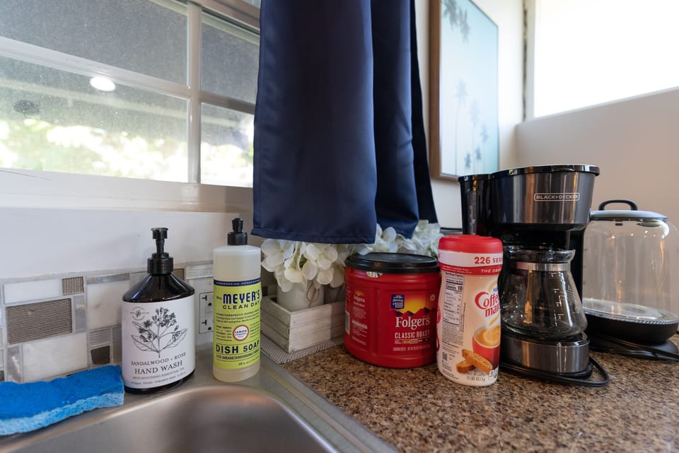 coffee machine, toaster, water boiler, utensils, coffee, coffee filter, creamer