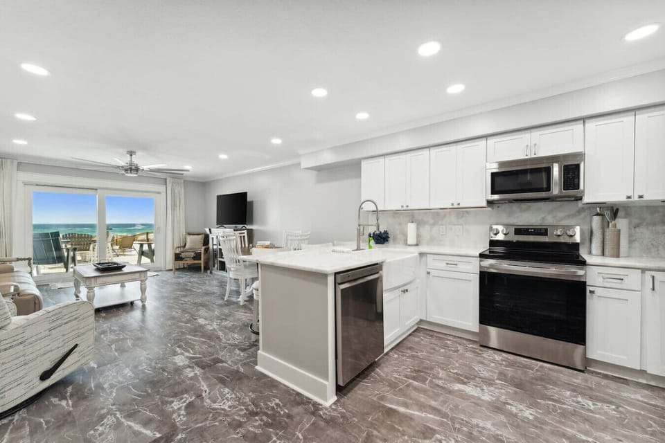 Living Area with Flat Screen TV plus Fully Equipped Kitchen