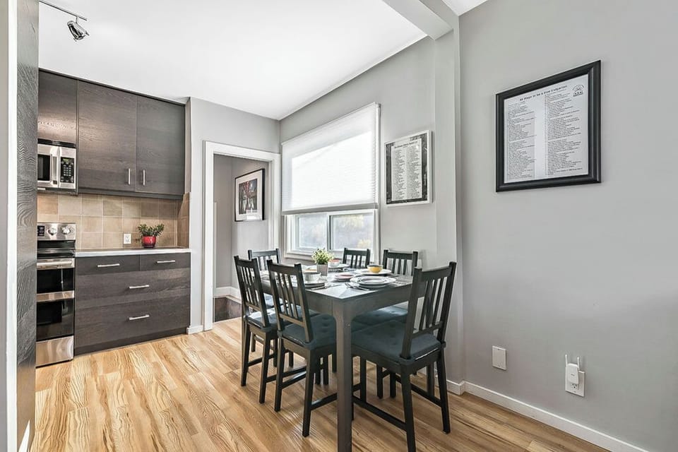 Dining table seats six but can expand to seat 8.